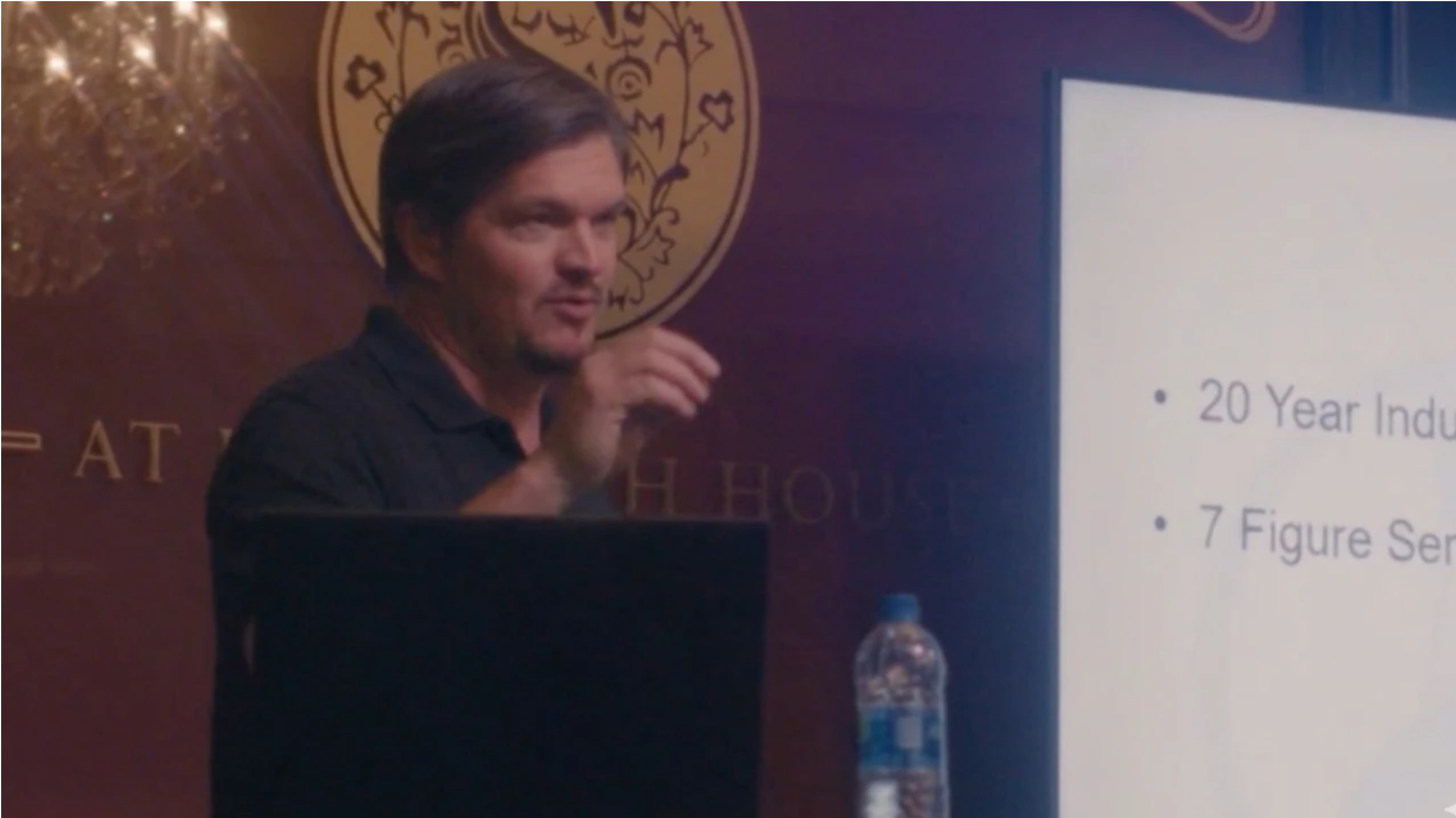 Mike Vidan speaking at a contractor conference on building a seven-figure service business